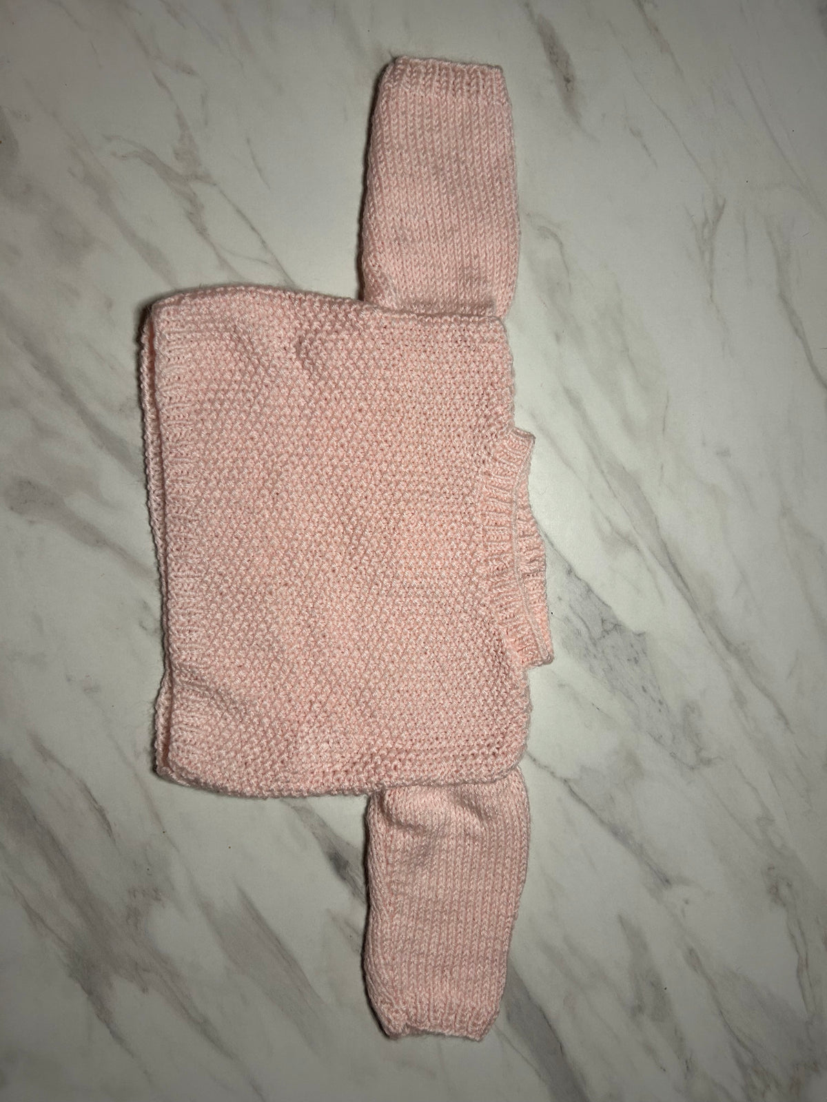 Pull bébé rose pâle à deux types de mailles – 1 an