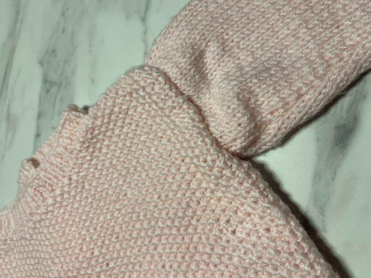 Pull bébé rose pâle à deux types de mailles – 1 an